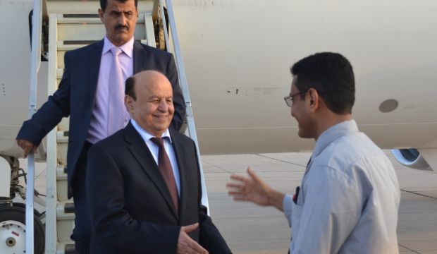 Yemeni President Abd Rabbuh Mansur Hadi arrives at an airbase adjoining the civilian airport in Yemen's war-ravaged southern city of Aden