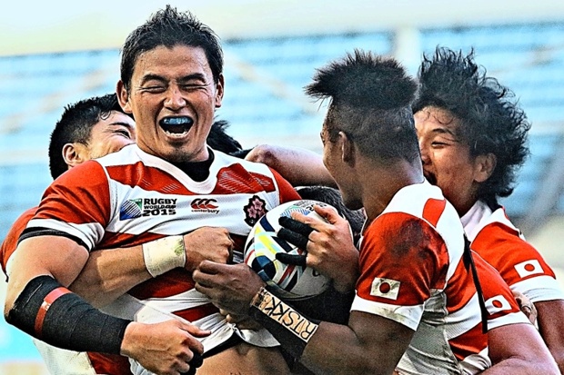 Goromaru is mobbed by team-mates after scoring Japan’s second try against South Africa
Charlie Crowhurst  Getty Images
