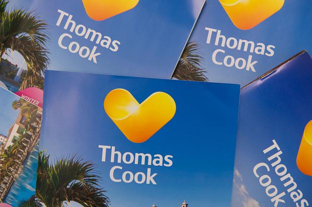 Travel brochures featuring the logo of travel company Thomas Cook