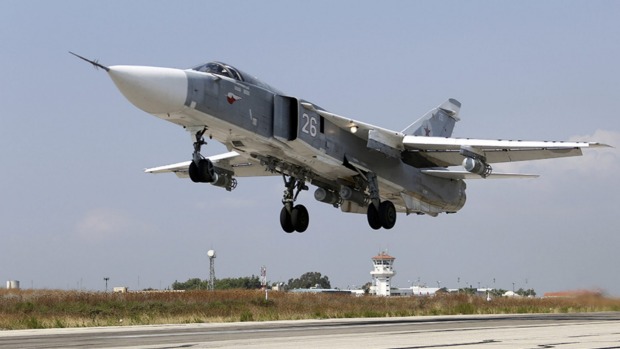 A Russian SU-24M fighter takes off from the Hmeimim air base in Syria