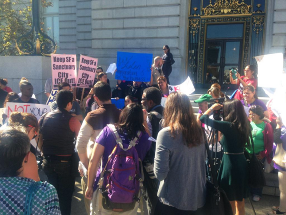 A crowd gathers to protest ICE and the removal of San Francisco sanctuary city policy