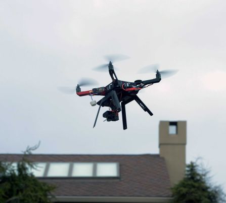 A drone with a high definition camera flies