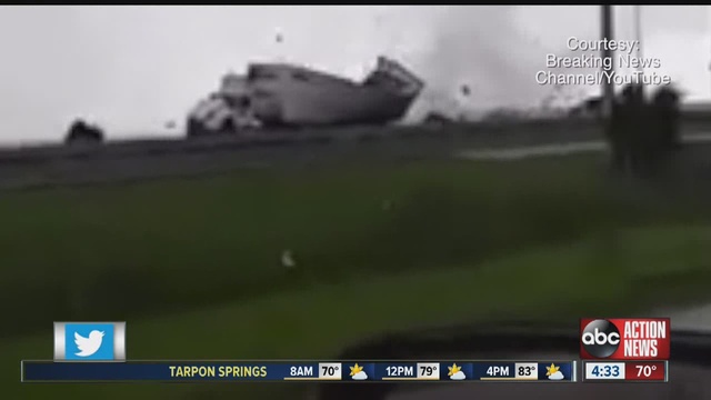 A funnel cloud lifted a tractor-trailer full of U.S. mail in the air Sunday morning while it was traveling on the Sunshine Skyway.                      WFTS