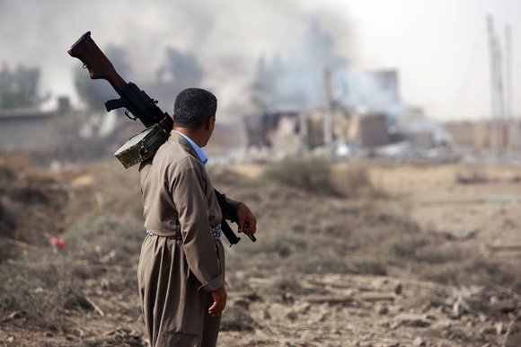 A peshmerga fighter in Iraq US commanders argued the Kurds needed American help last week