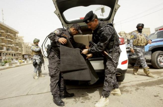 A security check outside the Green Zone in Baghdad March 2013