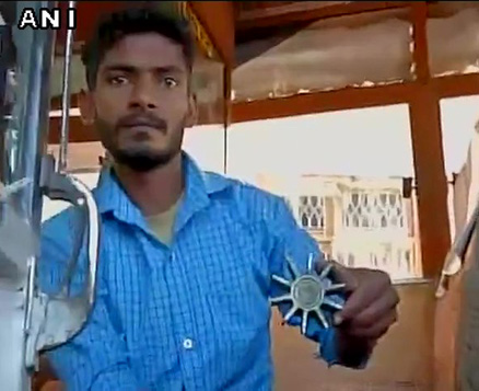 A villager showing mortar fired from Pakistan side