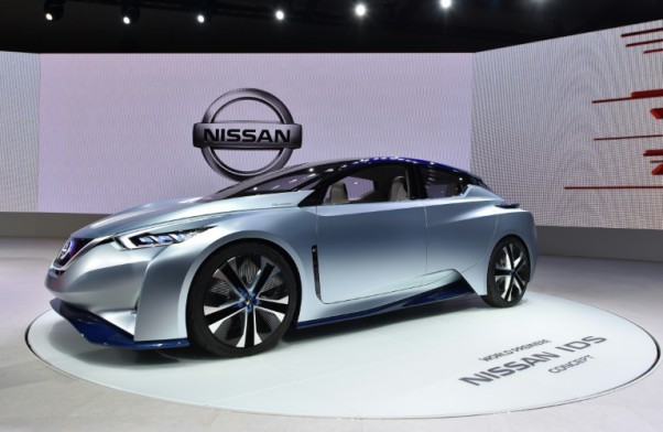 AFP  Kazuhiro Nogi Nissan Motor displays the Nissan IDS Concept car during a press preview at the Tokyo Motor Show 2015