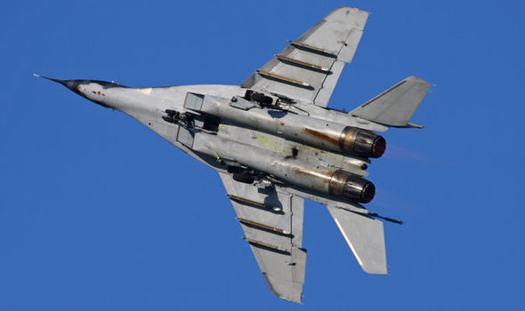 Mig-29 fighter jet in the blue sky