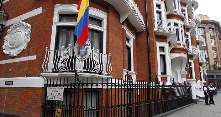 British police officers stand guard at the Ecuadorian Embassy in central London Wednesday Aug. 15 2012