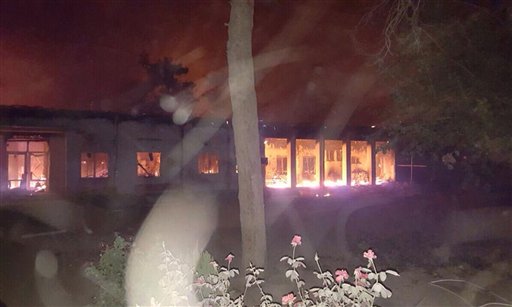 The Doctors Without Borders hospital is seen in flames after explosions in the northern Afghan city of Kunduz Saturday Oct. 3 2015. Doctors Without Borders announced that the death toll from the bombing of the group's Kunduz hospital compound has