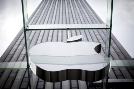 An Apple logo hangs above the entrance to the Apple store on 5th Avenue in the Manhattan borough of New York City