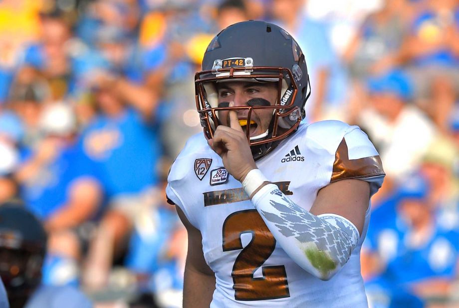 Arizona State quarterback Mike Bercovici gestures to fans after they scored a touchdown during the first half of an NCAA college football game against UCLA Saturday Oct. 3 2015 in Pasadena Calif