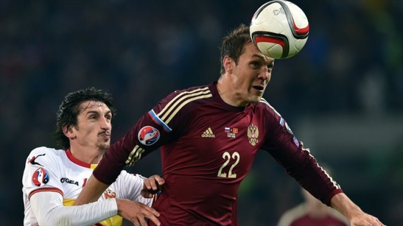 Artem Dzyuba heads away at the other end to ensure Russia protect their clean sheet