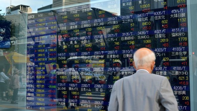 Asian shares mostly up on hopes Fed will delay rate rise