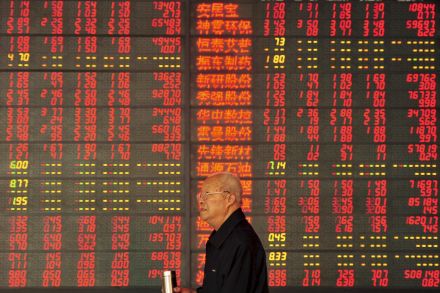 China stocks, yuan jump in heavy trade on stimulus hopes