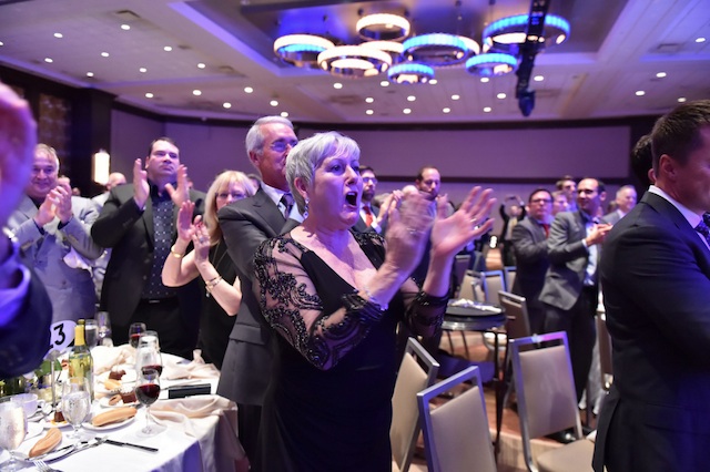 Attendee's of the Empire State Pride Agenda dinner react to the Governor's announcement last night