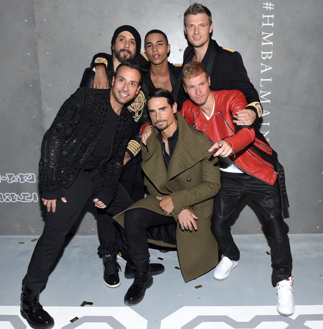 NEW YORK NY- OCTOBER 20 A. J. McLean Howie Dorough Kevin Richardson Brian Littrell and Nick Carter of the Backstreet Boys pose with Creative Director for Balmain Olivier Rousteing at the BALMAIN X H&M Collection Launch at 23 Wall Street on Octo