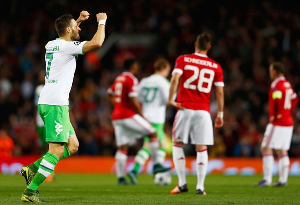 Daniel Caligiuri celebrates as he scores the first goal