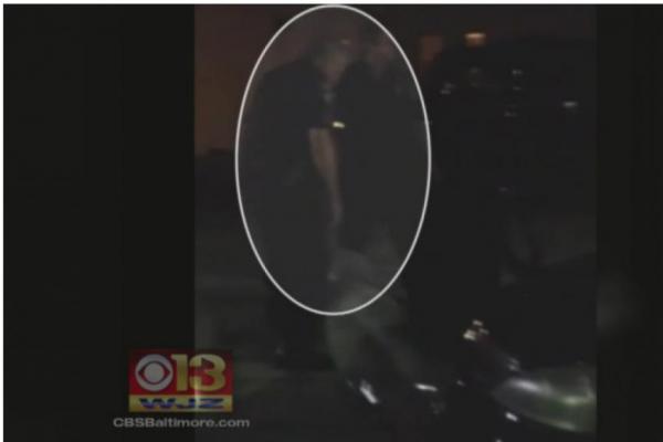 Baltimore police investigate video that shows officer spitting on suspect