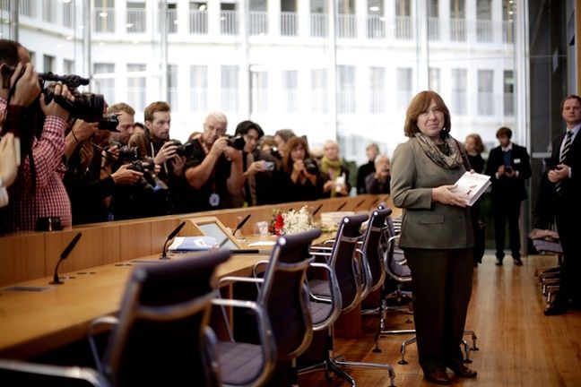 Belarus journalist and writer Svetlana Alexievich right the 2015 Nobel literature winner arrives for a news conference in Berlin Germany Saturday Oct. 10 2015