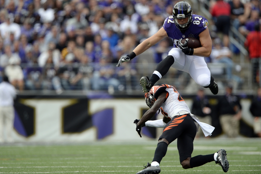 Sep 27 2015 Baltimore MD USA Baltimore Ravens tight end Nick Boyle leaps over Cincinnati Bengals cornerback Dre Kirkpatrick after the catch during the second quarter at M&T Bank Stadium. Mandatory Credit Tommy Gilligan-USA TODAY Sports