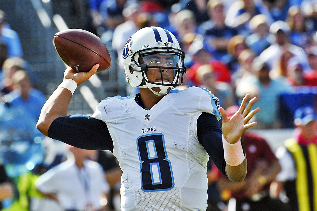 Tennessee Titans quarterback Marcus Mariota passes against the Buffalo Bills during the second half at Nissan Stadium. Buffalo won 14-13