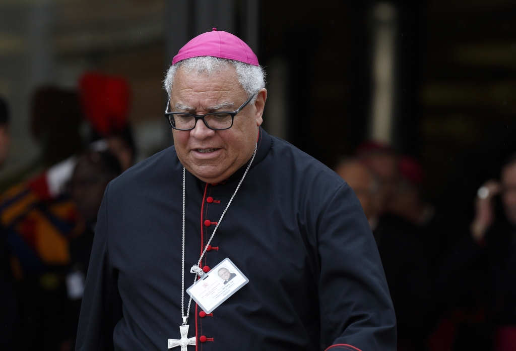 Bishop George V. Murry of Youngstown Ohio leaves a session of the Synod of Bishops on the family at the Vatican Oct. 14