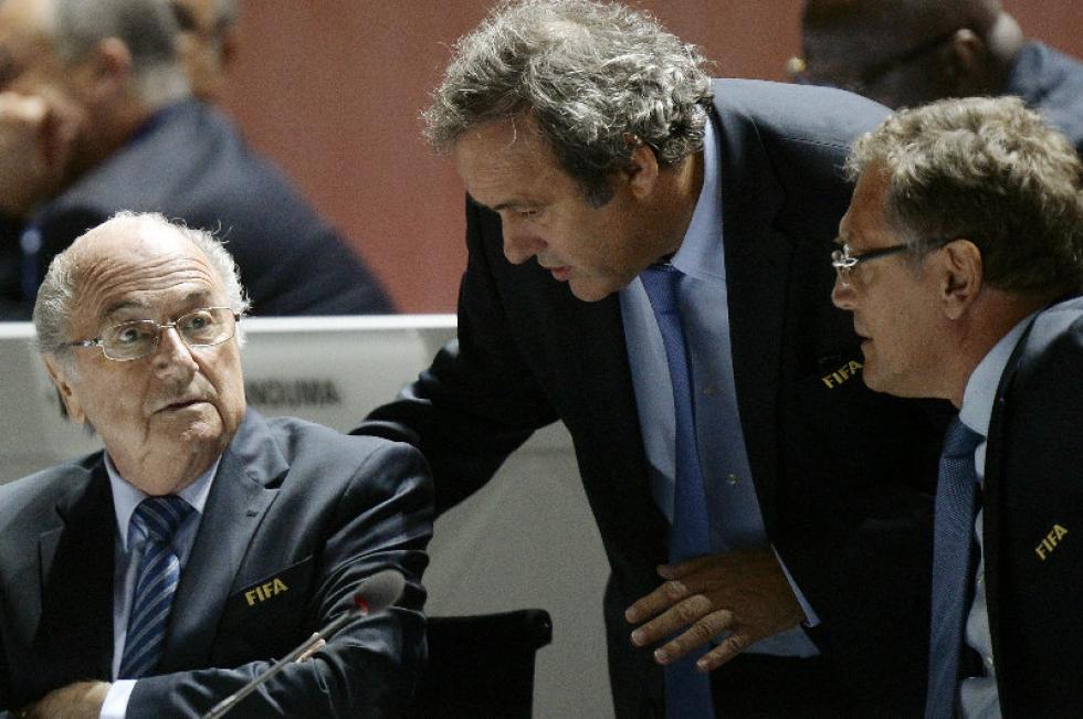 Associated Press FIFA President Sepp Blatter left UEFA President Michel Platini center and FIFA Secretary General Jerome Valcke right are engaged in conversation May 29 during the 65th FIFA Congress held at the Hallenstadion in Zurich Switzerlan