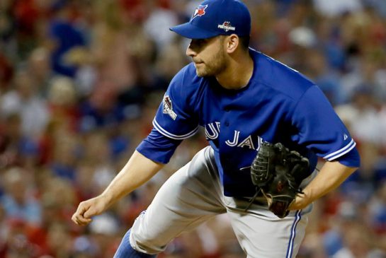 Toronto Blue Jays starting pitcher Marco Estrada follows through on his pitch during the first inning in Game 3 of baseball's American League Division Series against the Texas Rangers Sunday Oct. 11 2015 in Arlington Texas