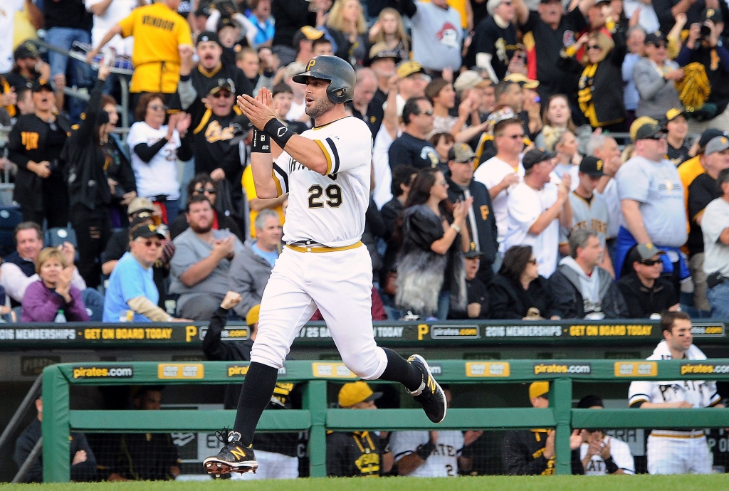 20151004JRPirates7 Francisco Cervelli cheers with the crowd as he heads home to put the Pirates up 3-0 against the Cincinnati Reds at PNC Park