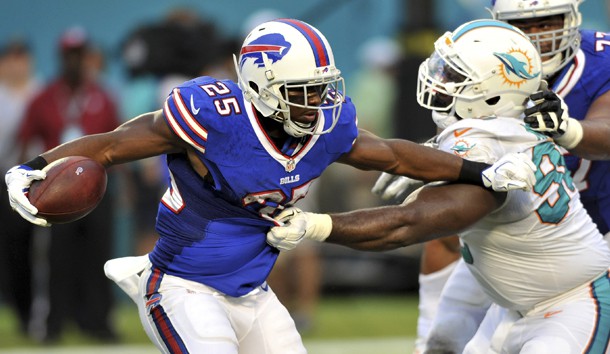 Sep 27 2015 Miami Gardens FL USA Buffalo Bills running back Le Sean McCoy is tackled by Miami Dolphins defensive tackle Earl Mitchell during the first half at Sun Life Stadium. Mandatory Credit Steve Mitchell-USA TODAY Sports