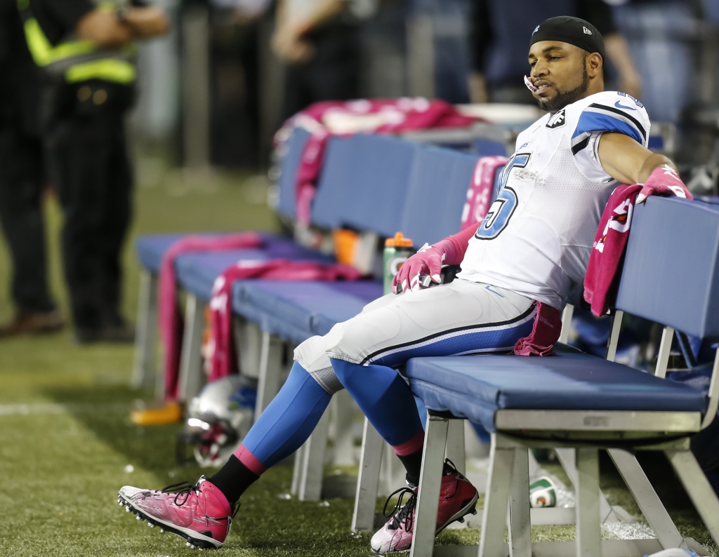 SEATTLE WASHINGTON- October 5 wide receiver Golden Tate #15 of the Detroit Lions sits on the bench late in the second half of a football game against the Seattle Seahawks at Century Link Field