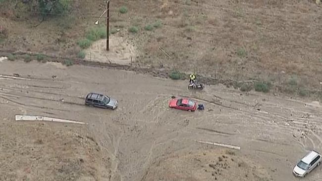 Cars became stranded in heavy mud Thursday afternoon near Lake Hughes California