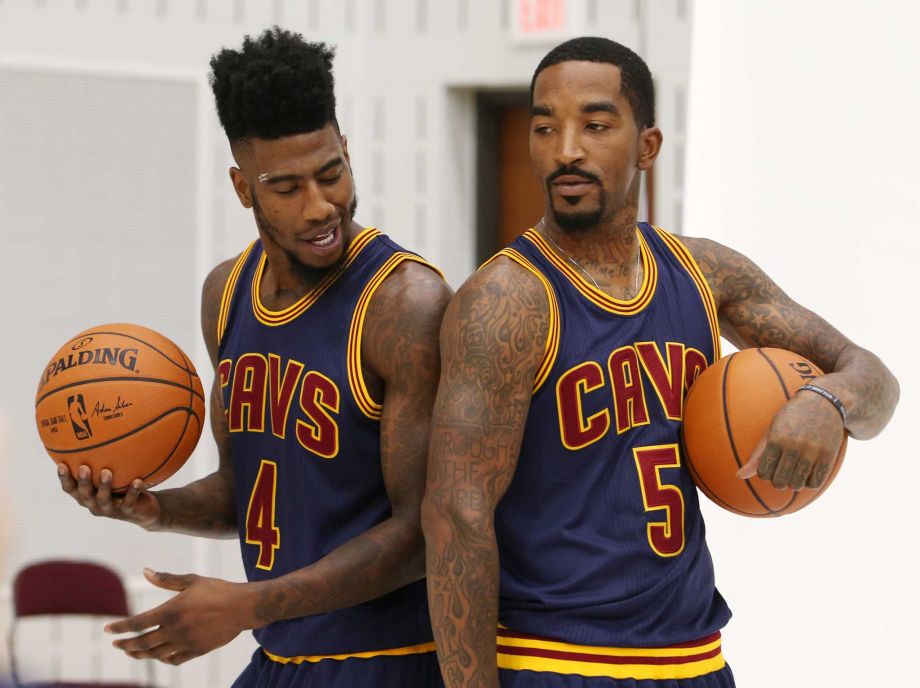 Cleveland Cavaliers Iman Shumpert left and J.R. Smith try to figure out how to pose for a portrait during the NBA team's media day Monday Sept. 28 2015 in Independence Ohio