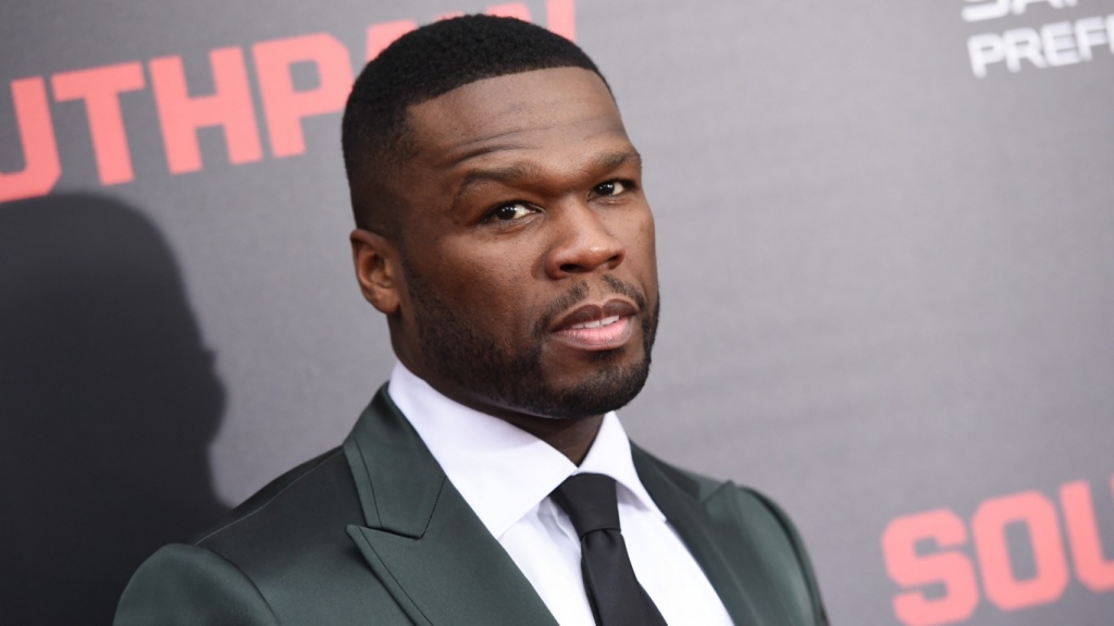 50 Cent gets flashy with his cash