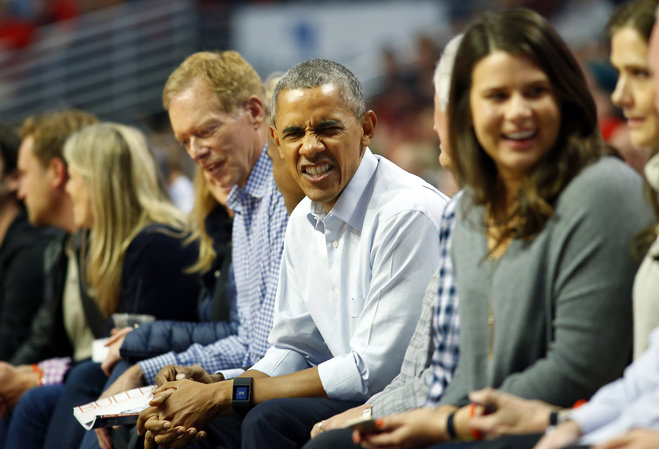 CORRECTS DAY OF WEEK TO TUESDAY NOT SATURDAY- President Barack Obama reacts to a call during an NBA basketball game between the Cleveland Cavaliers and the Chicago Bulls in Chicago on Tuesday Oct. 27 2015. CORRECTS DAY OF WEEK TO