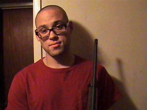 Space page that appeared to belong to Chris Harper Mercer shows him holding a rifle. Authorities identified Mercer as the gunman who went on a deadly shooting rampage at Umpqua Community College in Roseburg Ore. on Thursday