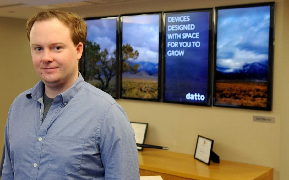 Austin McChord CEO of Datto poses for