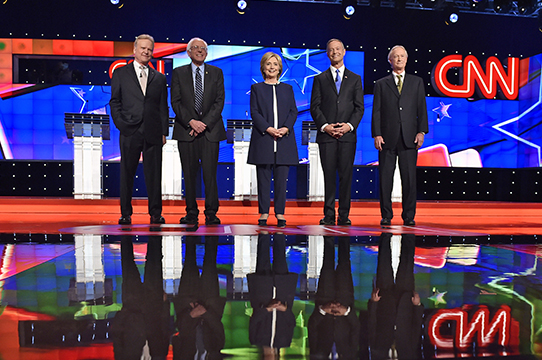 Democratic presidential candidates from left former Virginia Sen. Jim Webb Sen. Bernie Sanders of Vermont Hillary Rodham Clinton former Maryland Gov. Martin O'Malley and former Rhode Island Gov. Lincoln Chafee take the stage before the Democrat Part