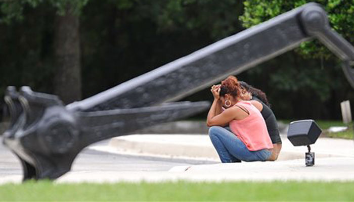 Families have gathered at the Seafarers Union Hall Sunday Oct. 4 2015 in Jacksonville Fla. waiting for news on the crew of 33 aboard the missing cargo ship El Faro. The ship has not been heard from since it lost power and was taking on water in seas