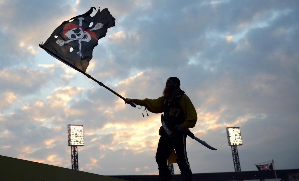 Louis Lambros'Bucco Louie of Mt. Lebanon cheers for the Pirates from his perch on the Clemente Bridge before the start of the National League wild card on the North Side