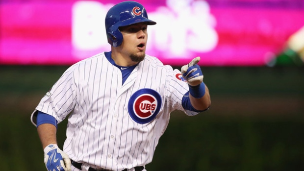 Chicago's Kyle Schwarber cleared the scoreboard at Wrigley Field with a long home run that clinched the NLDS series for the Cubs 6-4 over the St. Louis Cardinals