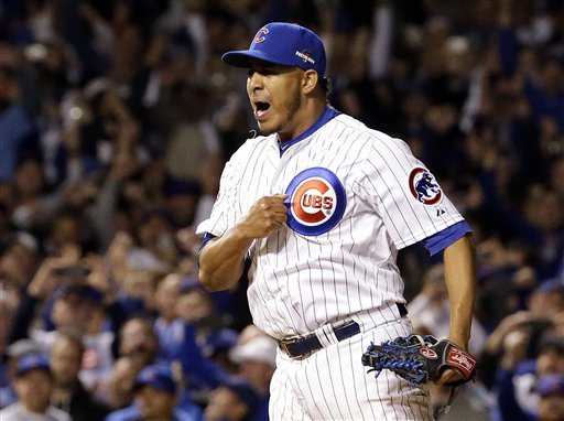 Chicago Cubs relief pitcher Hector Rondon celebrates after striking out Stephen Piscotty to win Game 4 of the National League Division Series