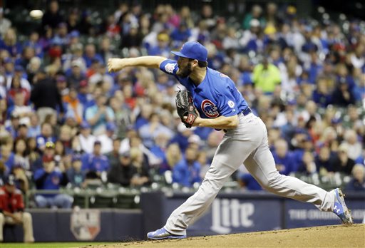 Chicago Cubs starting pitcher Jake Arrieta throws during the first inning of a baseball game against the Milwaukee Brewers Friday Oct. 2 2015 in Milwaukee