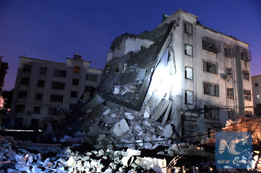 Damaged buildings at a blast site in Lizhou in south China's Guangxi Zhuang Autonomous Region on Sept. 30 2015