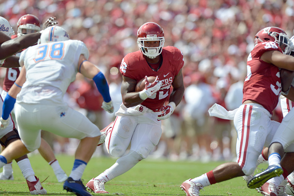 NORMAN OK- SEPTEMBER 19 Running back Samaje Perine #32 of the Oklahoma Sooners runs the ball against the Tulsa Golden Hurricane at Gaylord Family Memorial Stadium