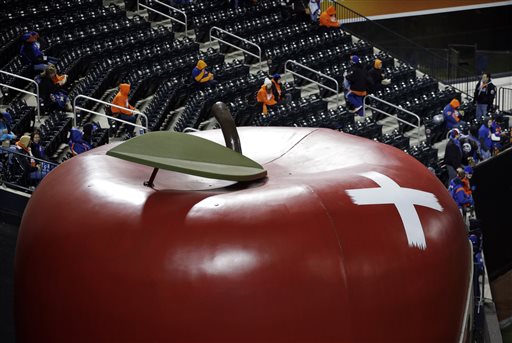 The giant apple in center field of Citi Field is seen with a bandage on it after a home run in the first game of National League baseball championship series between the New York Mets and the Chicago Cubs Sunday Oct. 18 2015 in New York. (AP