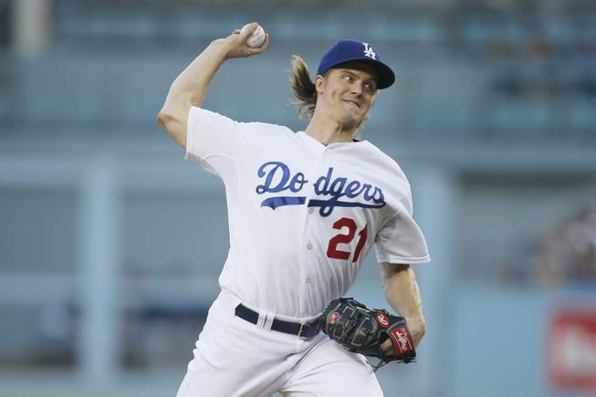 Danny Moloshok  Associated Press Los Angeles Dodgers starting pitcher Zack Greinke delivers against the San Diego Padres