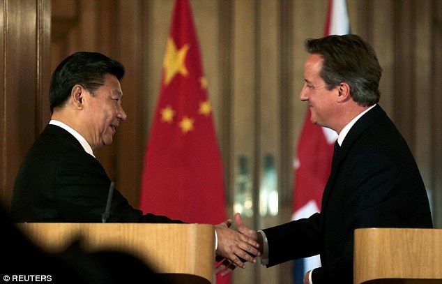 David Cameron unveiled a non-aggression pact with China on cyber-crime as he met with President Xi Jinping