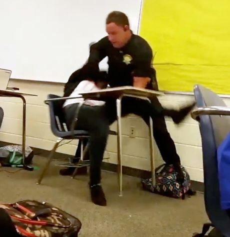 A student shot video showing Deputy Ben Fields’ actions with a female student at Spring Valley High School in Columbia S.C. In this Monday Oct 26 2015